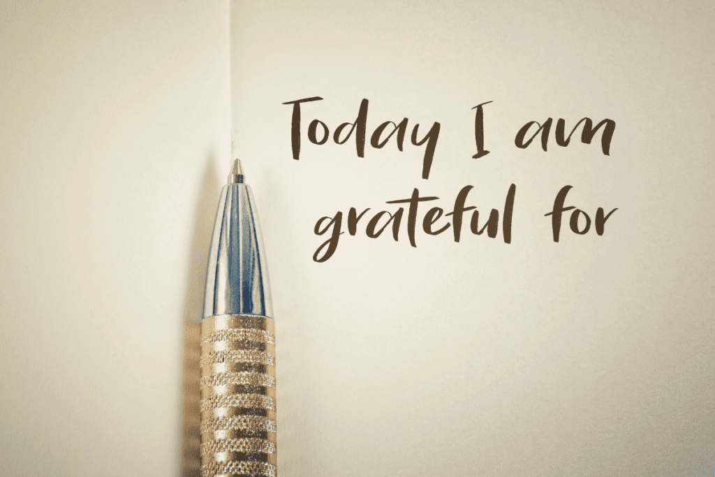 Pen and notebook with the words "Today I am grateful for" written on it.